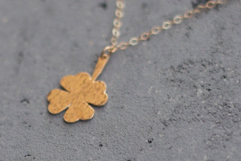 Golden four-leaf clover necklace