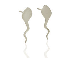 Silver sperm earrings attached to the ear