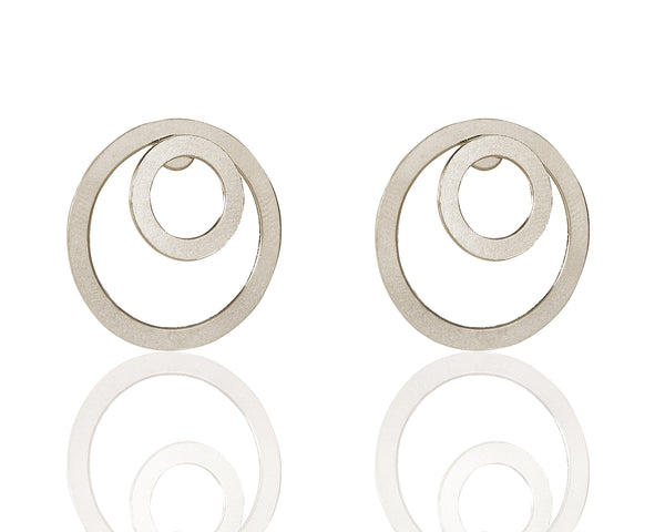 Round silver cuff earrings