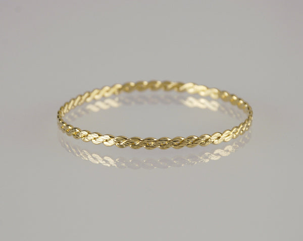 Golden braid hard bracelet