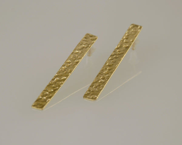 Long gold-plated rectangle earrings attached