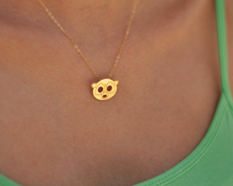 Gold raccoon necklace, Loris Haitian pendant