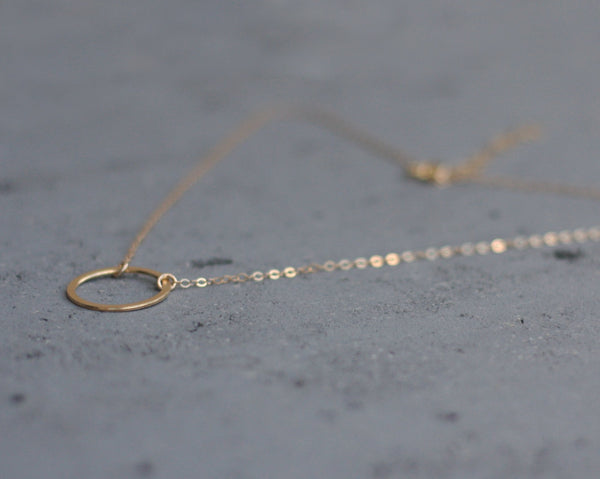 Gold choker necklace with hollow circle pendant