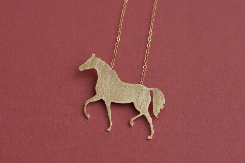 Gold horse necklace