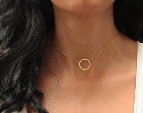 Gold choker necklace with hollow circle pendant