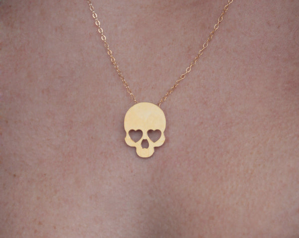 Skull necklace with heart eyes