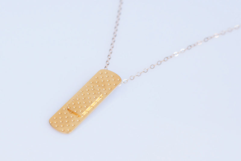 Gold plaster necklace