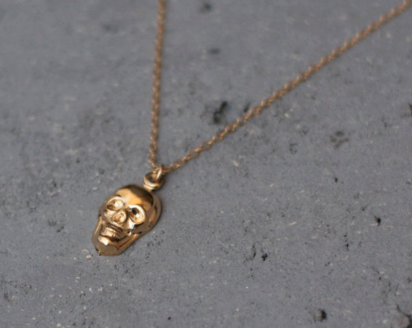 Gold skull necklace
