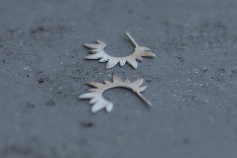 Studded silver sun spike earrings