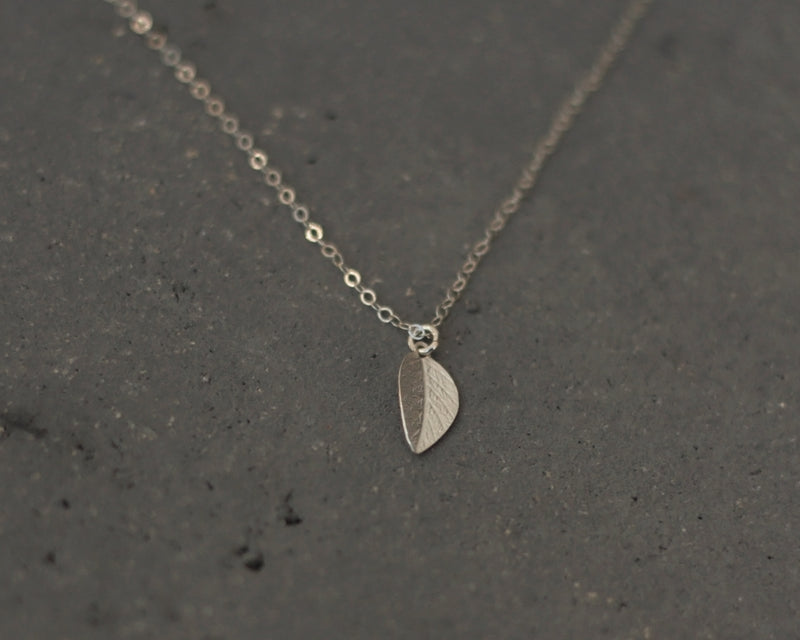 Delicate small silver leaf necklace