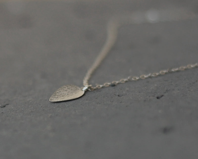 Delicate small silver leaf necklace