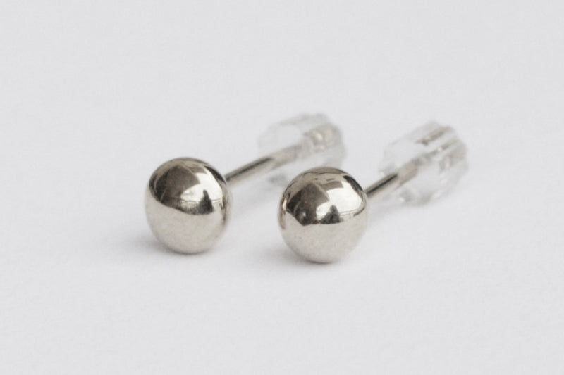 Small tight silver ball earrings