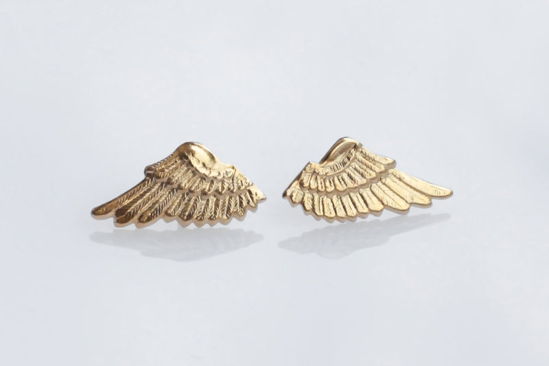 Wing earrings close to the ear