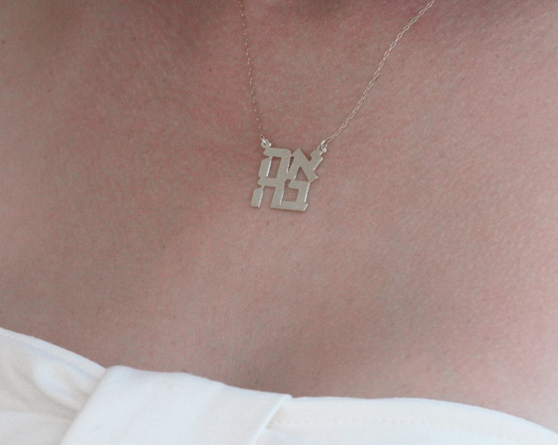 Small love inscription necklace in silver