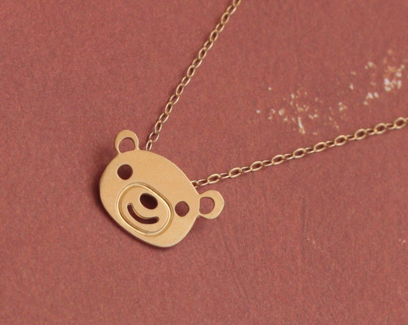 Small gold bear necklace