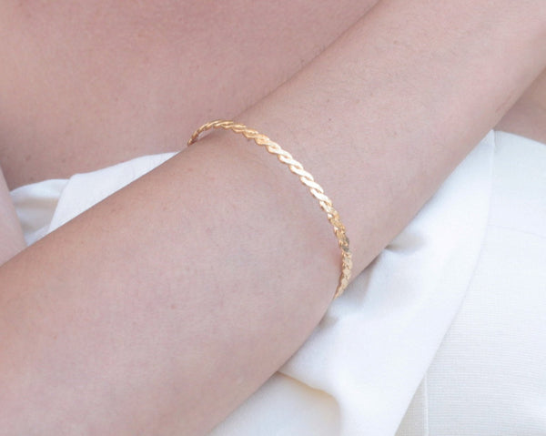 Golden braid hard bracelet