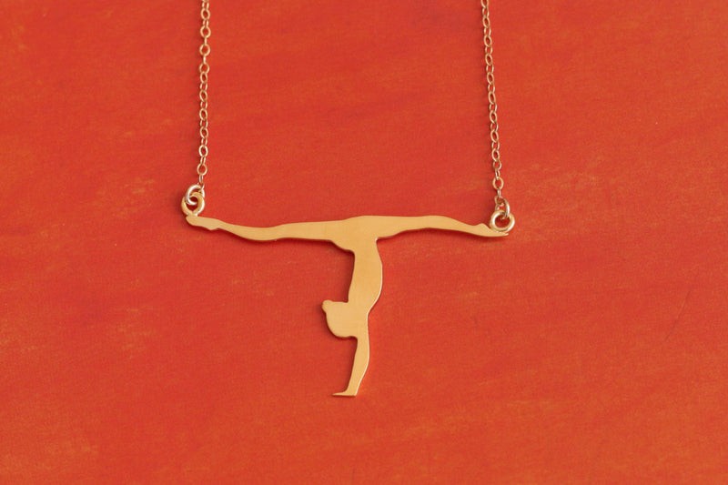 A chain of an artistic gymnast doing a pageant
