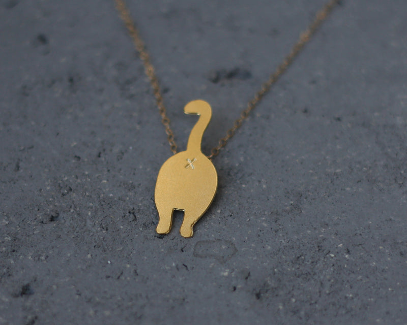 A cat's tusk necklace