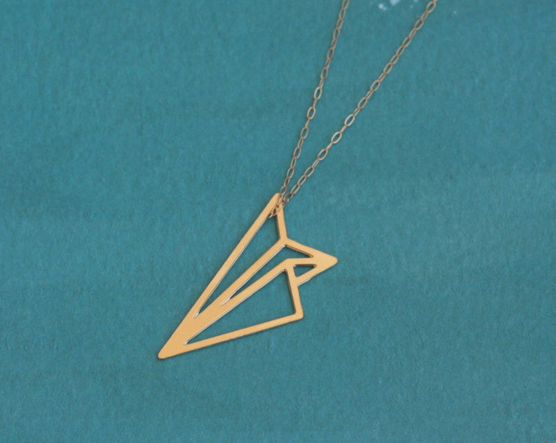Paper airplane necklace