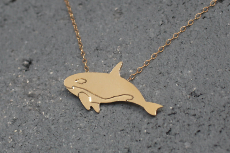 Gold whale necklace