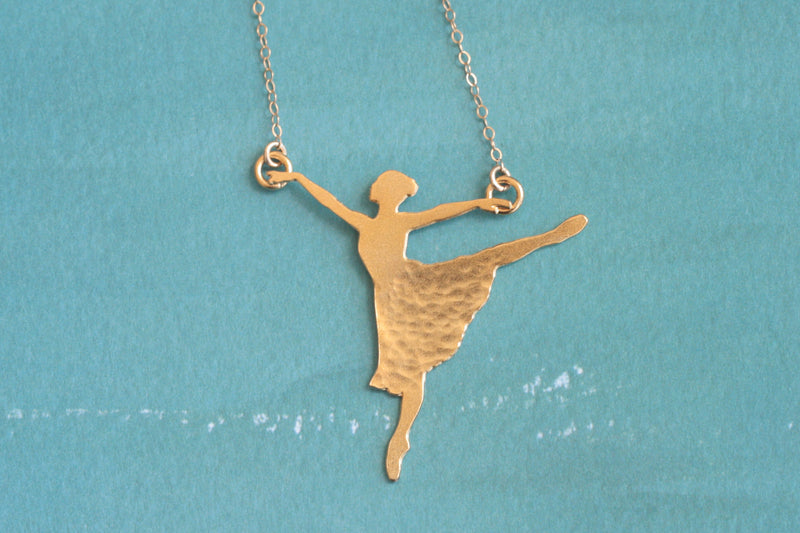 Gold ballet dancer necklace