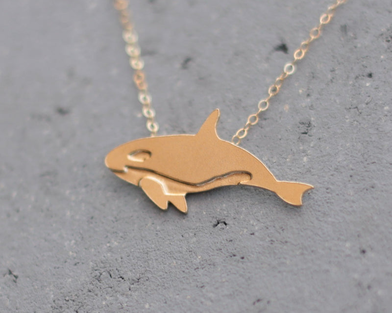 Gold whale necklace