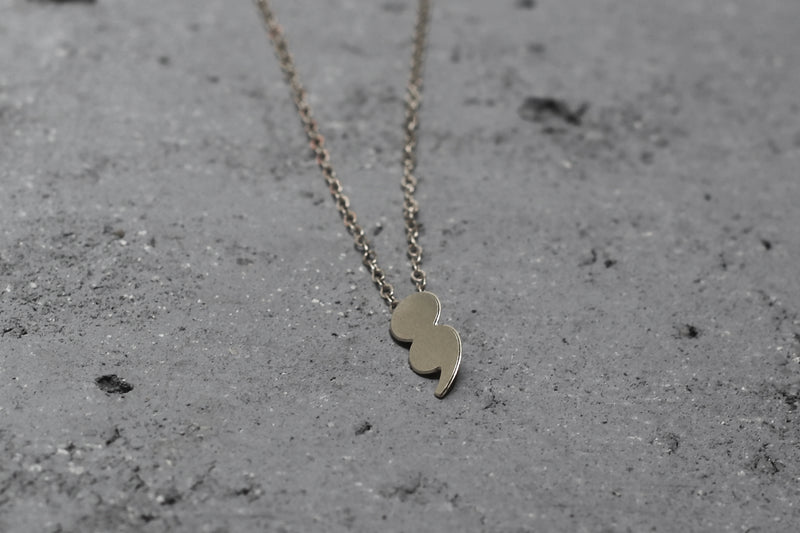 Silver dot comma necklace