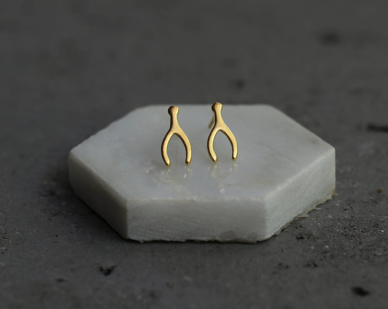 Attached gold wishbone earrings