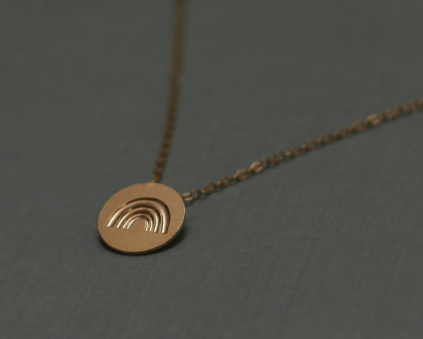 Circle necklace with gold rainbow