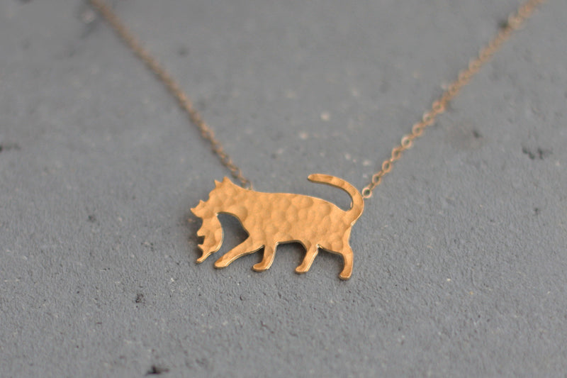 Cat necklace with gold puppy