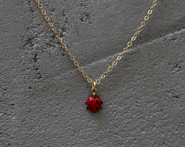 Delicate red ladybug beetle necklace