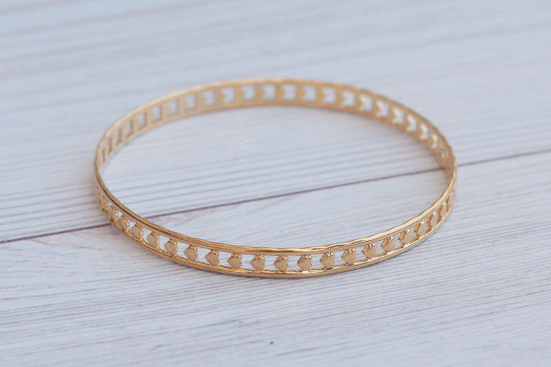 Thin hard gold heart bracelet