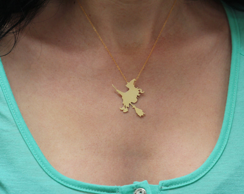Gold Witch on a broom Necklace