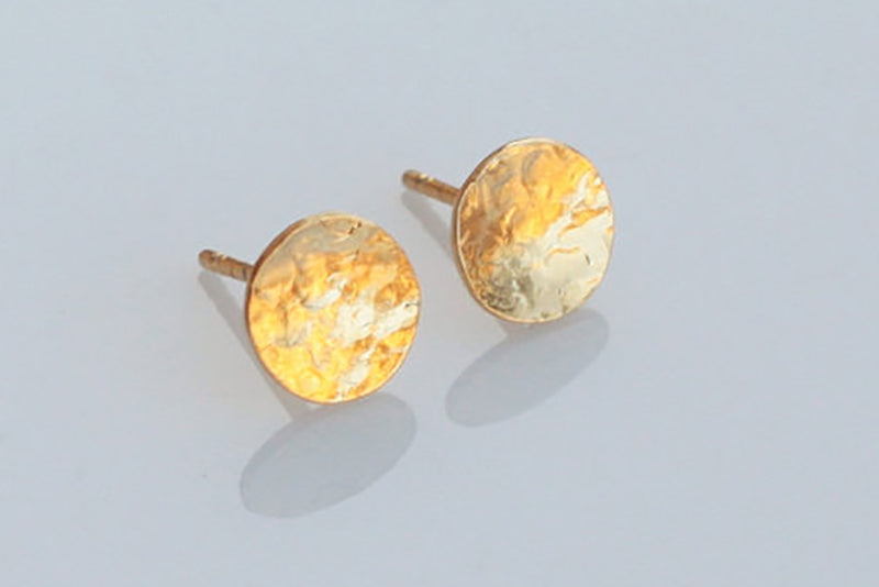 Round earrings close together small and hollowed out