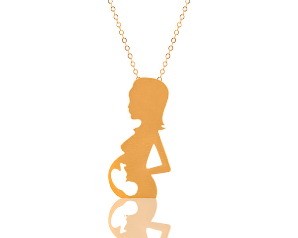 A pregnant woman necklace with a fetus